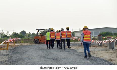 Group Of Construction Workers Walk Come Back Home In Construction Site 