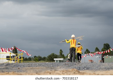 Group Of Construction Workers Walk Come Back Home In Construction Site 