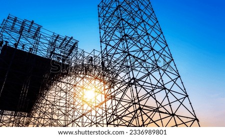 Group of construction workers working on scaffolding