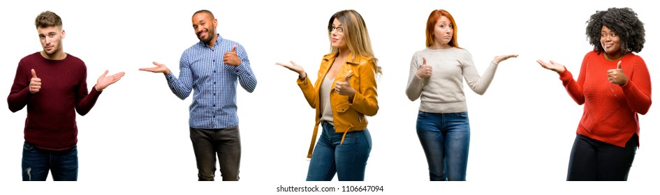 Group Of Cool People, Woman And Man Thumb Up Holding Something In Empty Hand And Making Ok Gesture