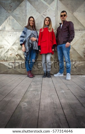 Similar – Couple of tourists walking down the street