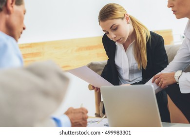 Group of coworkers having discussion during meeting - Shutterstock ID 499983301