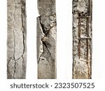 Group of Cracked concrete columns affecting the strength of the building structure isolated on white background.