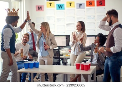 Group Of Creative Casual Corporate Coworkers Having Fun In The Office; Casual Friday Concept