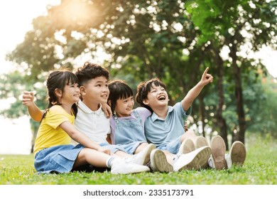 group of cute asian kids having fun in the park - Powered by Shutterstock