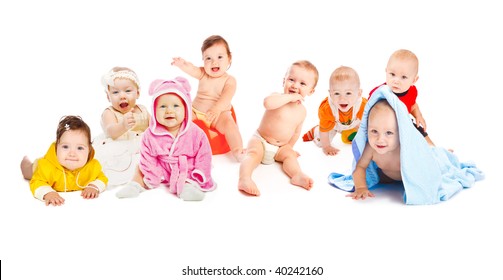 Group Of Cute Happy Children. Sitting, Crawling Or Lying.