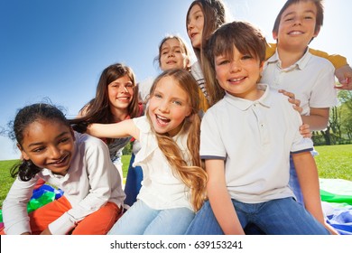 Group Of Cute Kids Having Fun Together In The Park