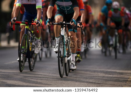 Group cyclist professional in a race.