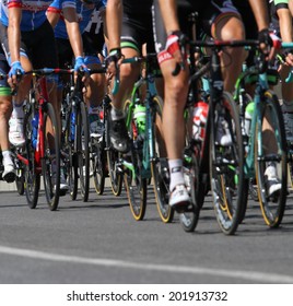 The Group Of Cyclists Ride Uphill During The International Cycling Race