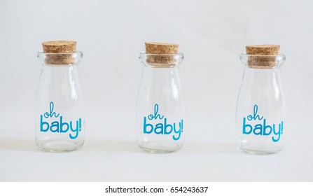 Group Of Decorative Empty Jars, Ready To Serve Drinks At A Baby Boy Shower