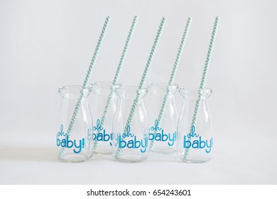 Group Of Decorative Empty Jars With Straws, Ready To Serve Drinks At A Baby Boy Shower