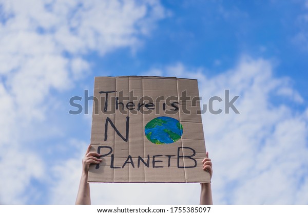 Group of demonstrators on road. Activists\
protesting on social issues. Race fight and climate change\
protesting activist during lockdown. global warming and\
environmental issues. Activists\
protesting