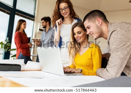 Group of design experts working on new project .