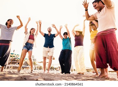 Group Of Different People Dancing Together At Beach Party - Multi Generational Family Enjoying Holiday Outside - Summer Vacations