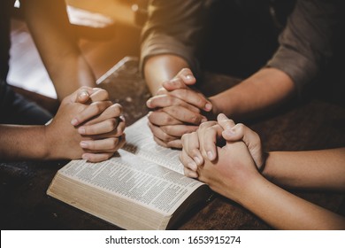 Group of different women praying together, Christians and Bible study concept.  - Powered by Shutterstock