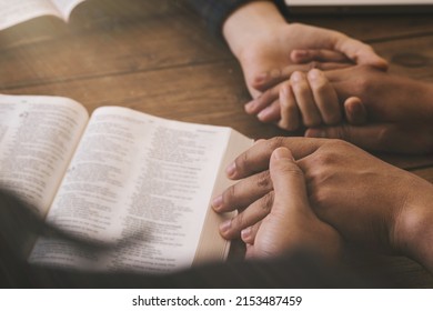 Group of different women praying together, Christians and Bible study. Begging for forgiveness and believe in goodness. Christian life crisis prayer to god.  - Shutterstock ID 2153487459