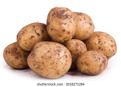Group of dirty unpeeled new potatoes isolated on white background - Shutterstock ID 2018271284