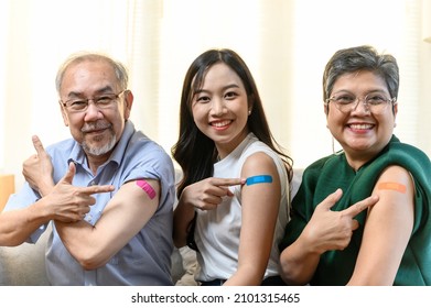 Group Of Diverse Age Asian People Family Senior Showing Bandage Plaster On Arm After Received Covid Vaccination For Prevent Covid-19 Infection. Coronavirus Pandemic Protection Health Care Concept.