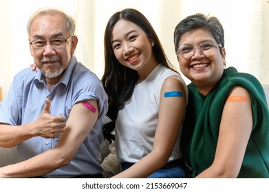 Group Of Diverse Age Asian People Family Senior Showing Bandage Plaster On Arm After Received Covid Vaccination For Prevent Covid-19 Infection. Coronavirus Pandemic Protection Health Care Concept.