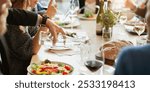 Group of diverse business people dining, business lunch. Diverse people have conversation at business lunch at restaurant. Social gathering with food and wine, diverse people group have business lunch