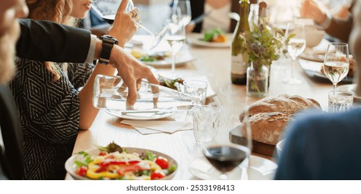 Group of diverse business people dining, business lunch. Diverse people have conversation at business lunch at restaurant. Social gathering with food and wine, diverse people group have business lunch - Powered by Shutterstock