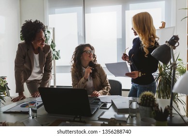 Group of diverse businesswomen discussing new project - Powered by Shutterstock