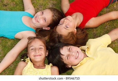 Group Of Diverse Children Playing Outside.