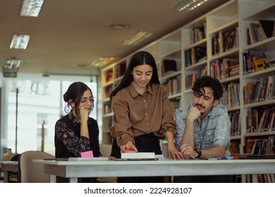 Group Of Diverse Colleagues Working On The Computers In The Modern Office Or Coworking Space