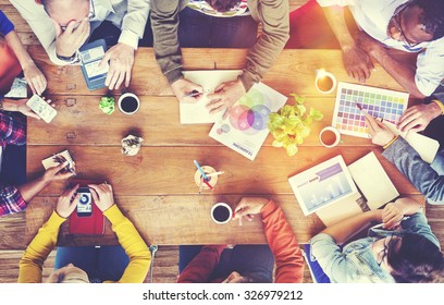 Group of Diverse Designers Having a Meeting Concept - Powered by Shutterstock