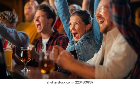 Group of Diverse Friends Cheering for Their Team, Drinking Beer at a Pub Counter. Supportive Fans Cheering, Applauding and Shouting. Joyful Friends Celebrate Victory After the Goal. - Powered by Shutterstock