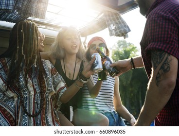 Group of Diverse Friends Drinking Beers Alcohol Together on Road Trip - Powered by Shutterstock