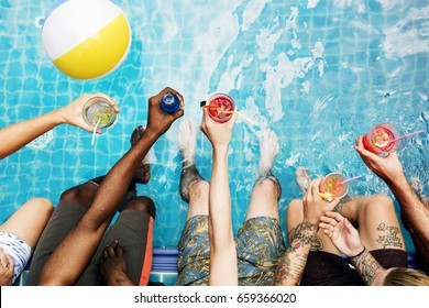 Group of diverse friends enjoying summer time with beverage - Powered by Shutterstock