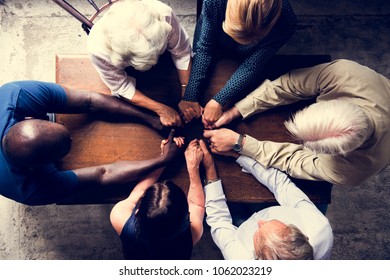 Group Of Diverse Hands Holding Each Other Support Together Teamwork Aerial View