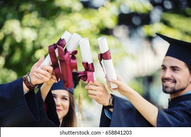 Group of diverse International Graduating Students celebrating - Shutterstock ID 658841203