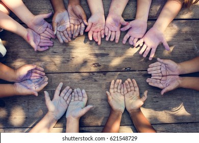 Group Of Diverse Kids Hands With Chalk Paint