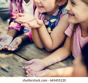 Group Of Diverse Kids Hands With Chalk Paint