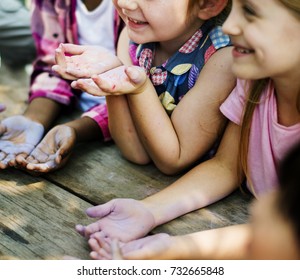 Group Of Diverse Kids Hands With Chalk Paint