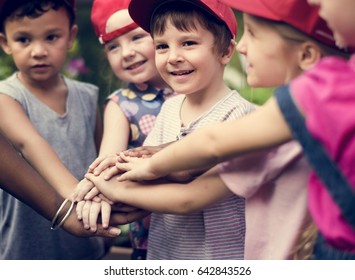 Group Of Diverse Kids Hands Out Together Teamwork