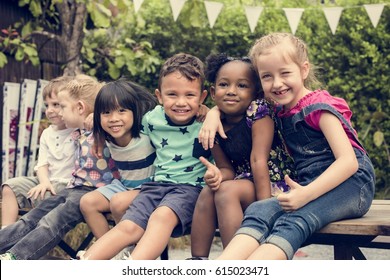 Group Of Diverse Kids Sitting Together