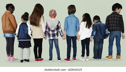 Group Of Diverse Kids Students Standing In A Row Holdings Hands