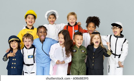 Group Of Diverse Kids Wearing Career Costume Studio Portrait