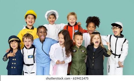 Group Of Diverse Kids Wearing Career Costume Studio Portrait