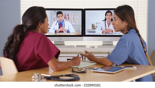 Group Of Diverse Medical Doctors Video Conferencing