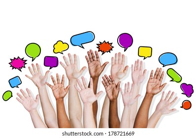 Group Of Diverse Multi Ethnic Hands Reaching For Speech Bubbles