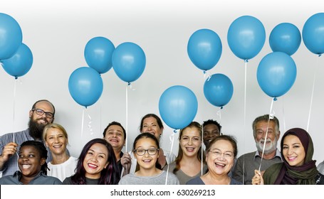 Group Of Diverse People With Party Balloons