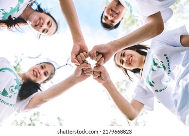 Group Of Diverse People Volunteer Team With Hand Stack To Show Teamwork Spirit Togetherness, Concept Of Success Community Charity People Volunteering On Social To Achievement On World Environment Day.