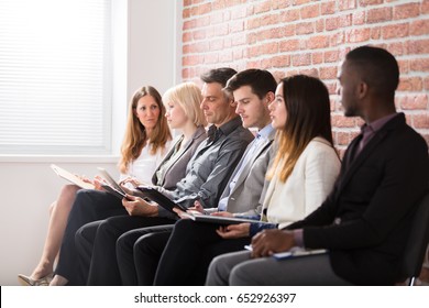 Group Of Diverse People Waiting For Job Interview In Office