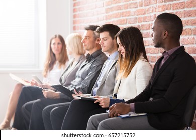 Group Of Diverse People Waiting For Job Interview In Office - Shutterstock ID 657215752
