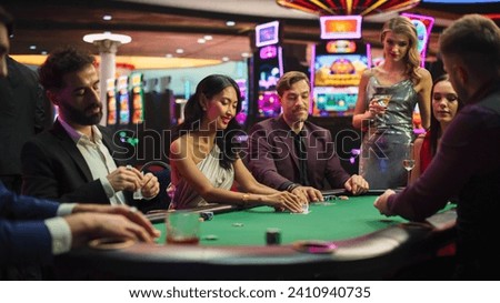Group of Diverse Poker Players Sitting at a Table as the Croupier Deals the Playing Cards in a Modern Casino. An Intense Round of a Gambling on a Championship, People do the Betting.