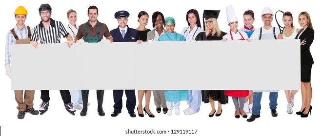 Group of diverse professionals presenting empty banner. Isolated on white - Powered by Shutterstock